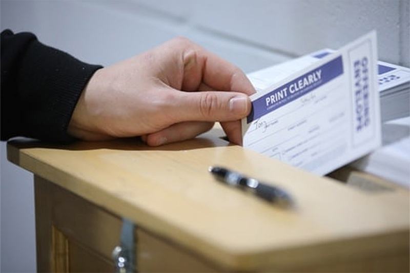 Putting envelope in offering