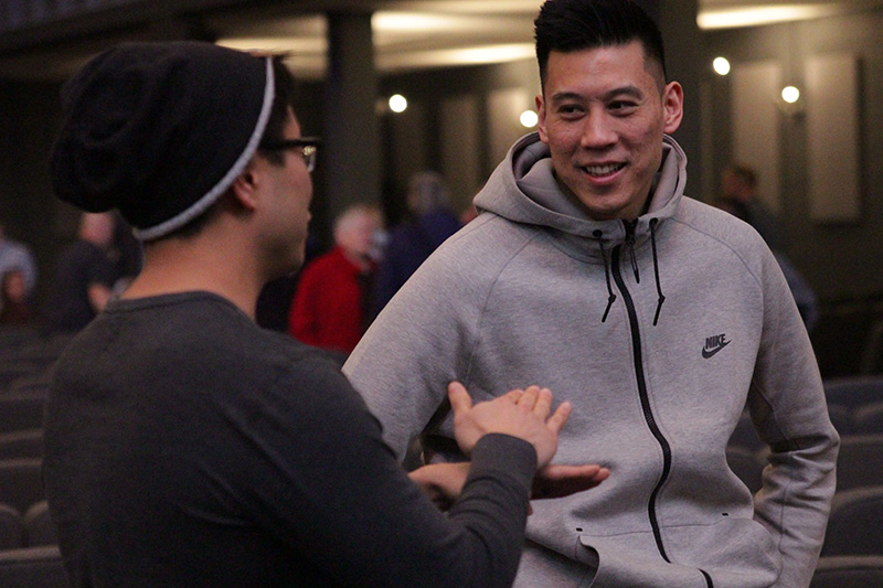 Two men talking to each other