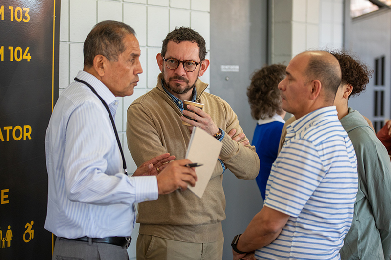 People gathered around speaking