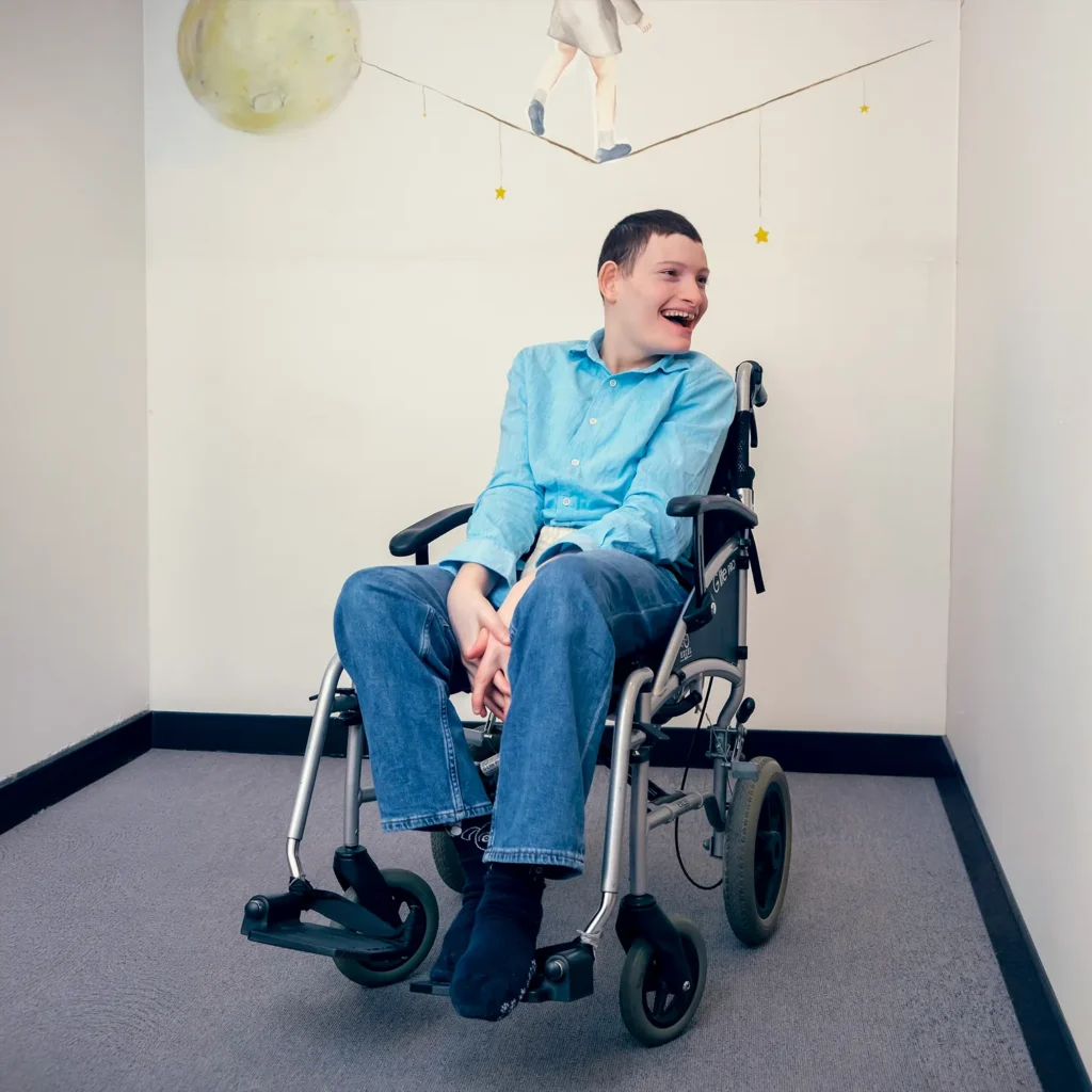A young man on a wheelchair