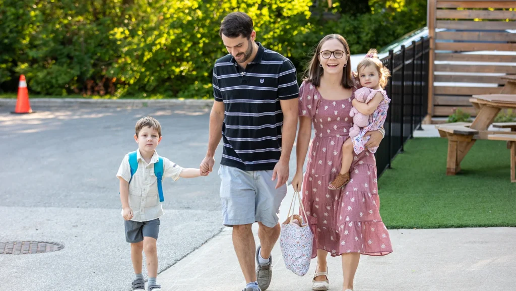 Family walking into church at Redemption from the parking lot