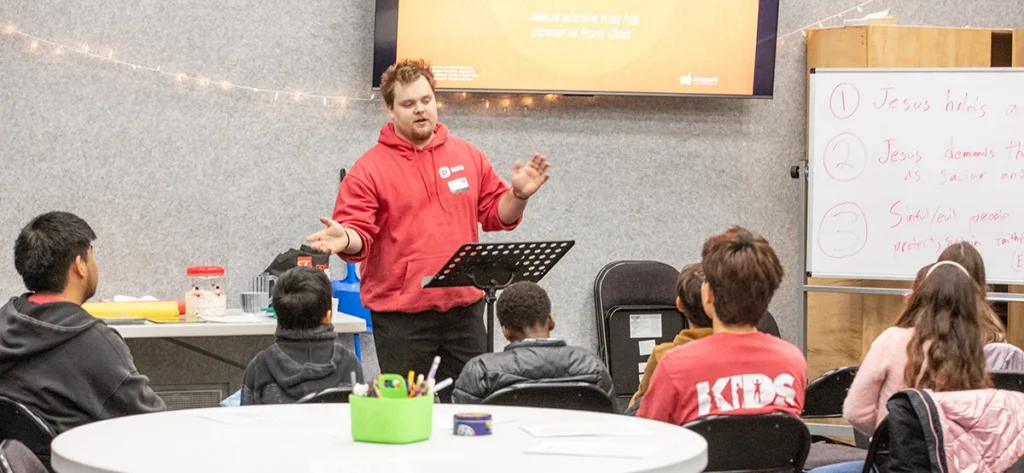 Sunday school teacher teaching class