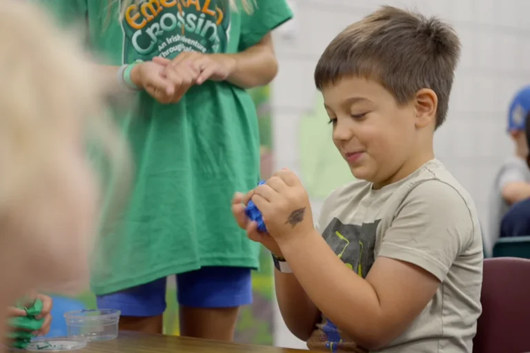 A boy doing a craft