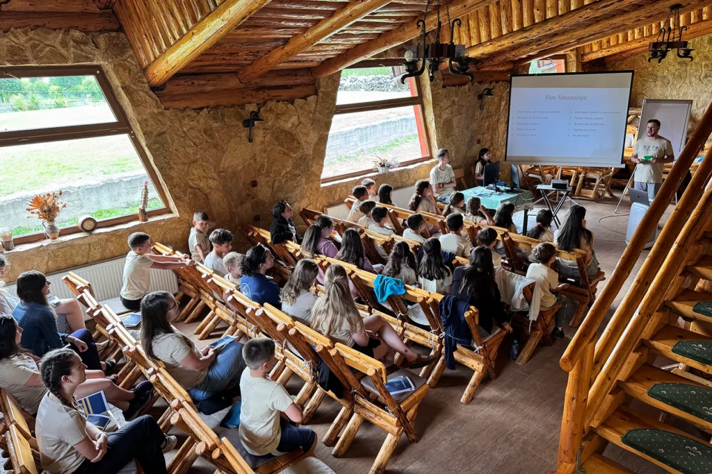 Members from Redemption at a church abroad teaching and training a group of people