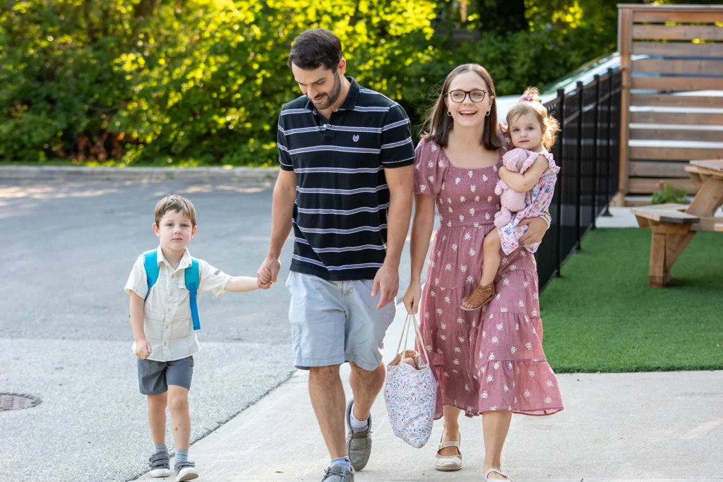 A family walking into church at Redemption Bible Chapel