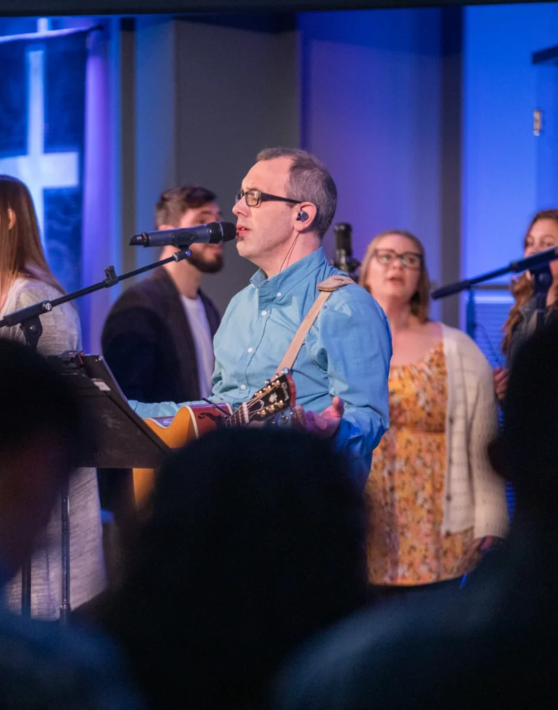 Worship team leading people in worship